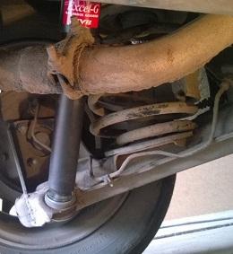 замена заднего амортизатора